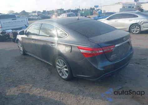 2014 Toyota Avalon Limited z USA, uszkodzony, nr VIN 4T1BK1EB7EU131022